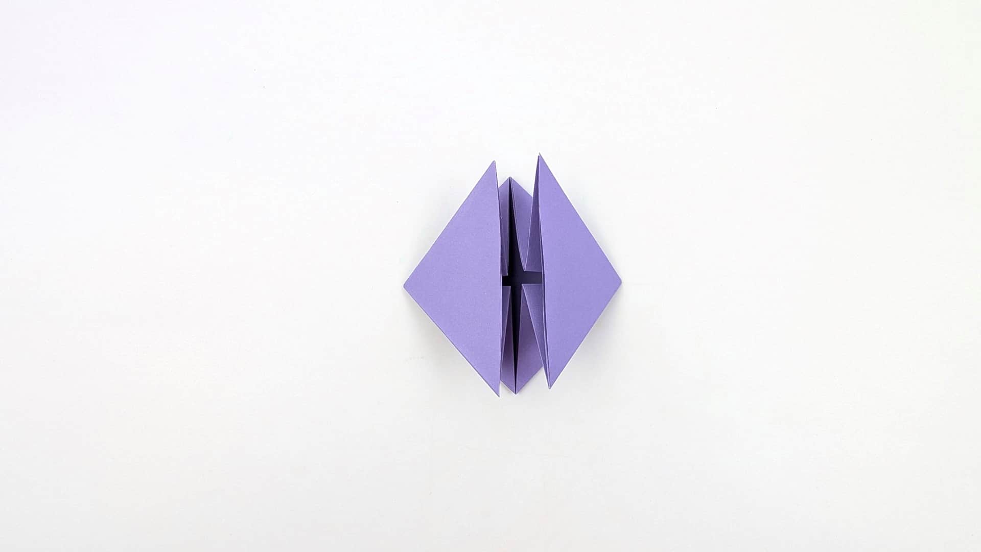 Flatten the collapse. You now have two diamond shapes sitting side by side, joined at the center.