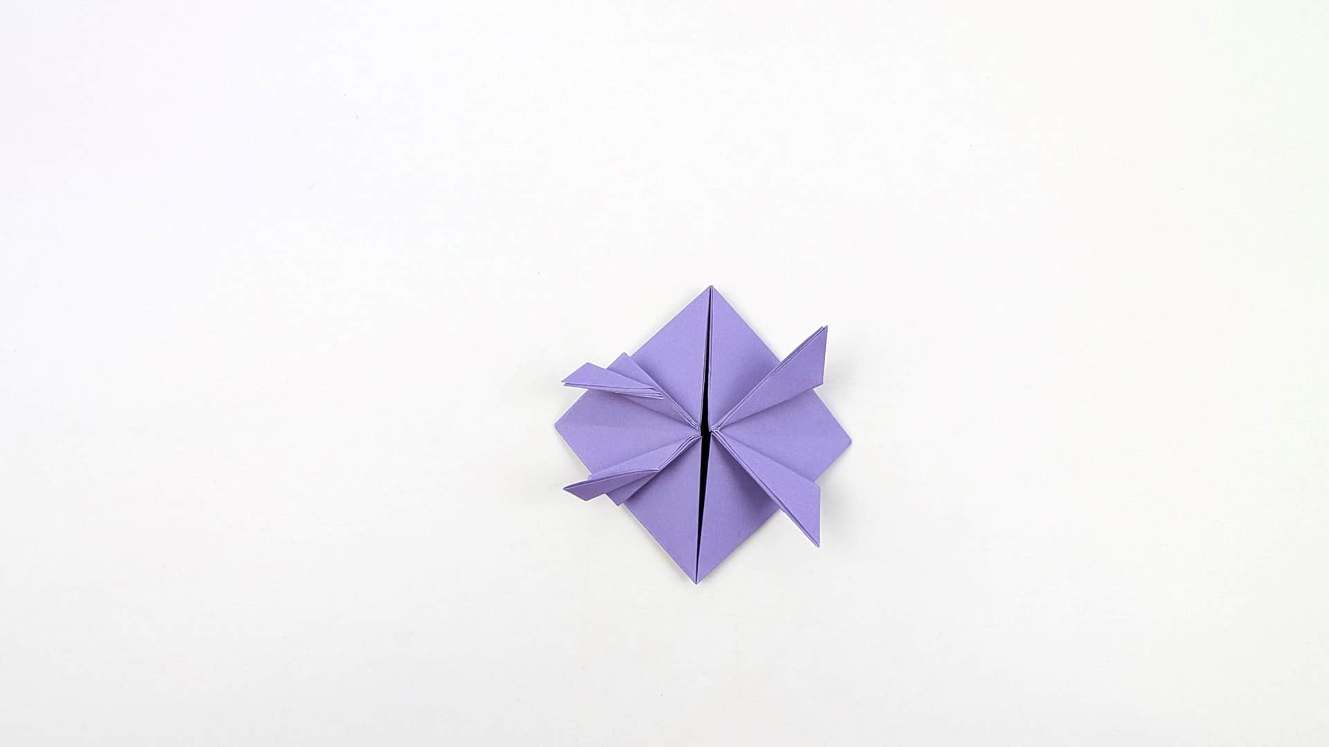 Gently shape two of the corner points by bending them slightly — you are individually adjusting each of the four leg points.