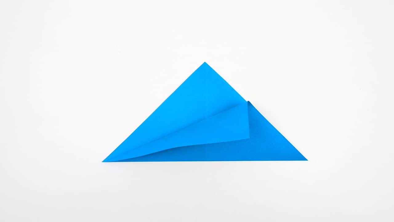 The preliminary base should be a flat square with open flaps at the bottom.