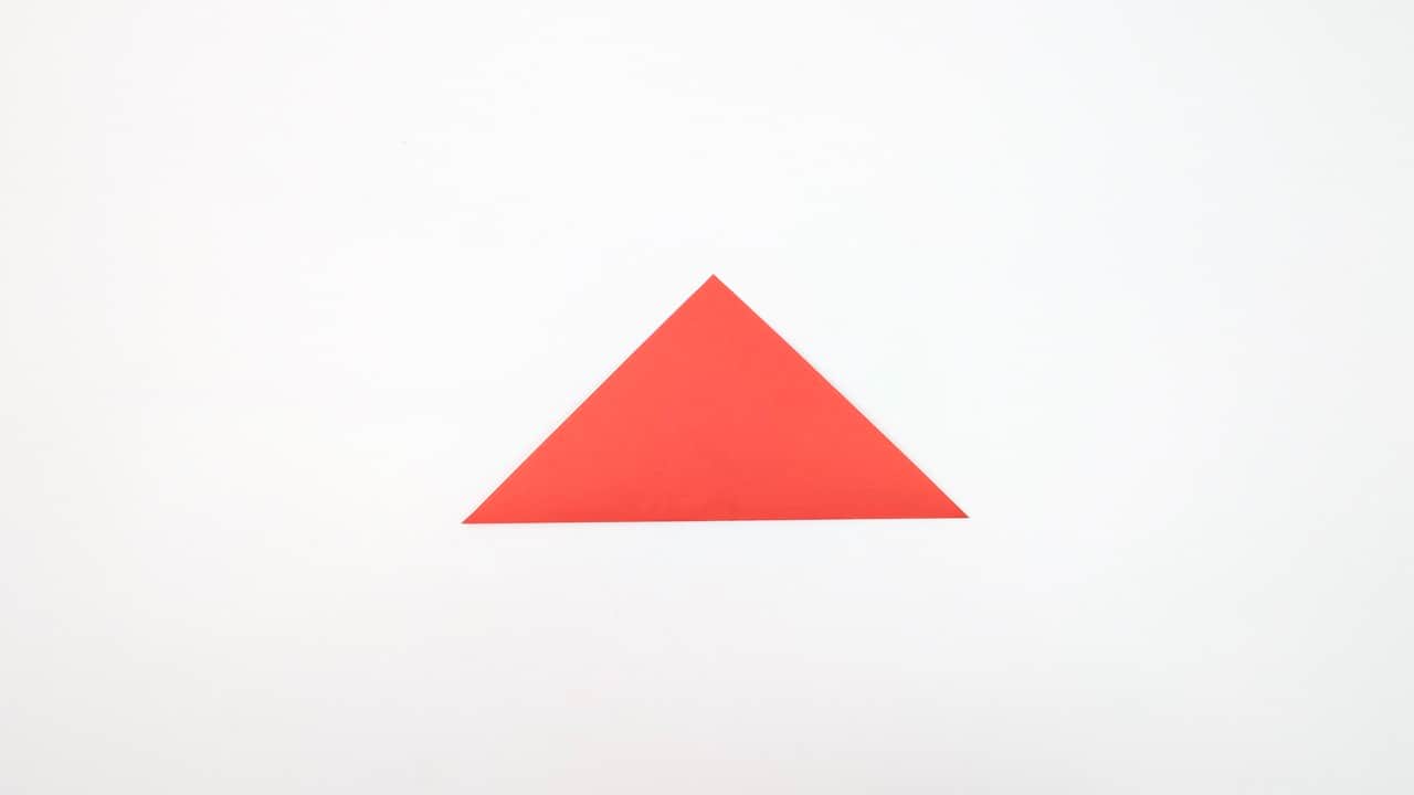 Fold all four corners to the center point of the square.