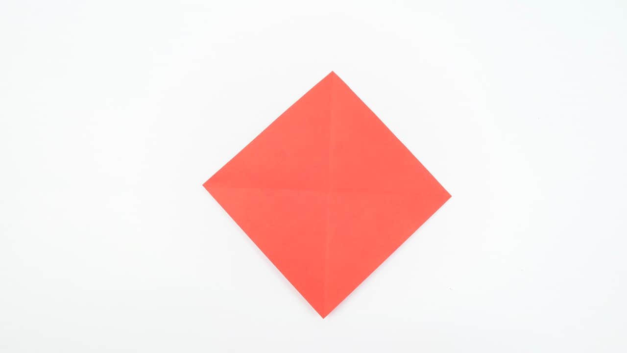 Press flat. You now have a smaller square — the double blintz base.